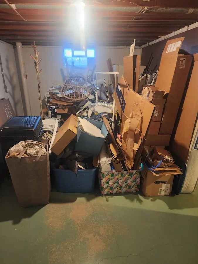 Roll-off dumpster container at job site for Yard Waste Dumpster Rental in Youngsville